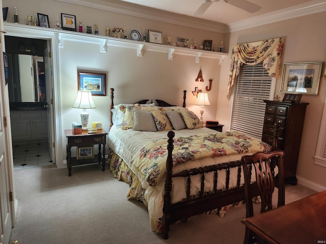 carpeted bedroom with crown molding and ceiling fan