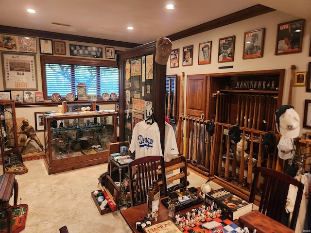 interior space with crown molding