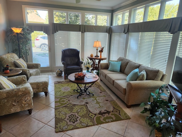 living room featuring ornamental molding and light tile patterned floors