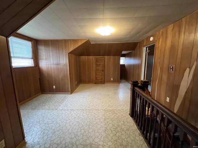 additional living space with wooden walls