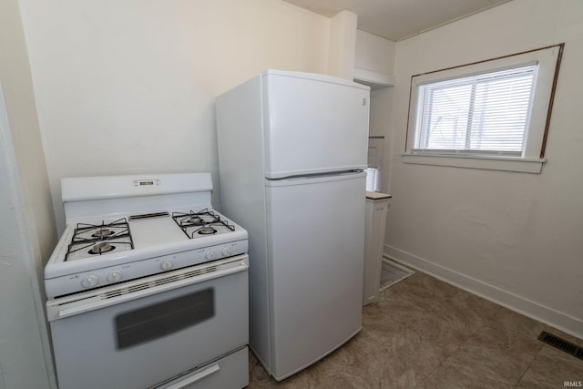 kitchen featuring white appliances