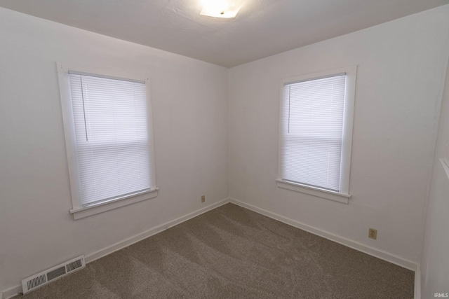 empty room featuring carpet