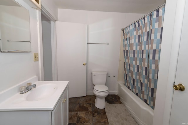 full bathroom with shower / bath combo, vanity, and toilet