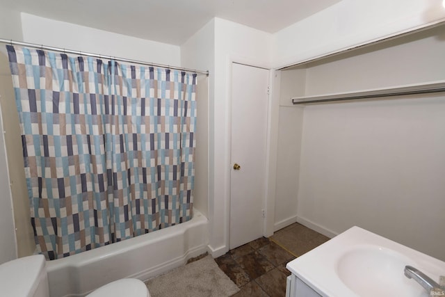 full bathroom featuring vanity, shower / bathtub combination with curtain, and toilet