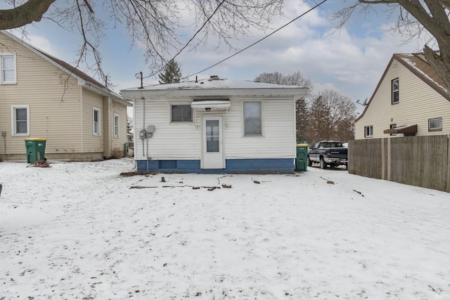 view of snow covered property