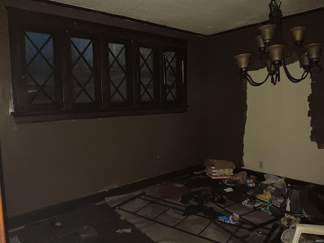 unfurnished dining area featuring an inviting chandelier