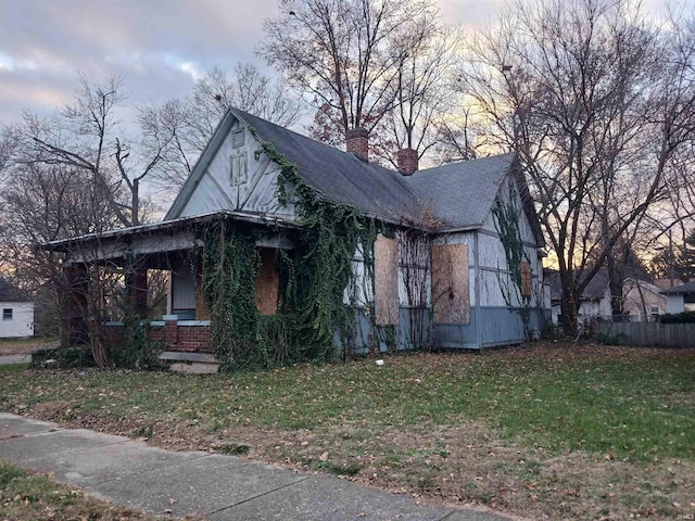 view of front of home with a yard