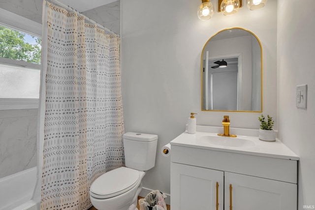 full bathroom with shower / tub combo with curtain, vanity, and toilet