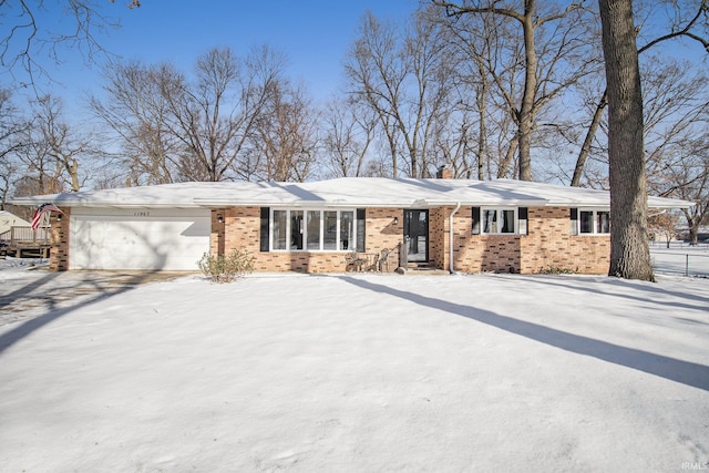 ranch-style home with a garage