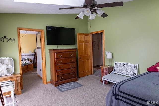 carpeted bedroom with ceiling fan and lofted ceiling