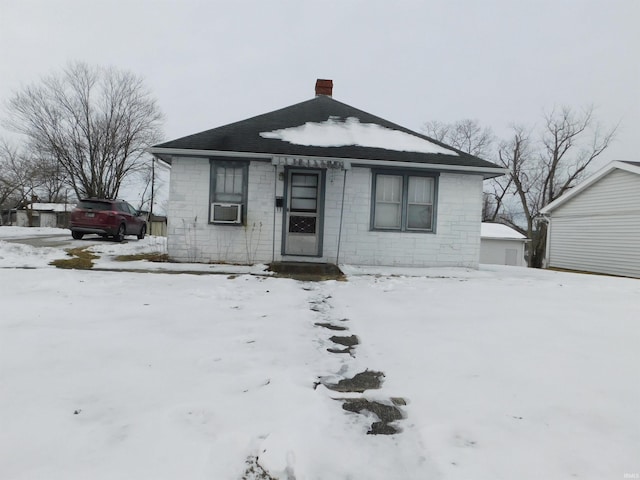 view of front of home with cooling unit