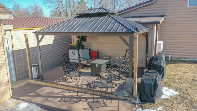 view of patio with a grill