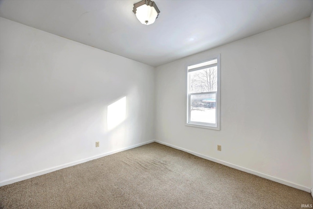 empty room featuring carpet flooring