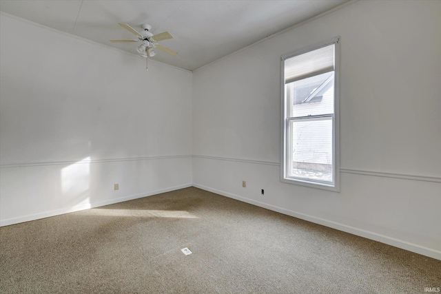 unfurnished room with carpet floors and ceiling fan