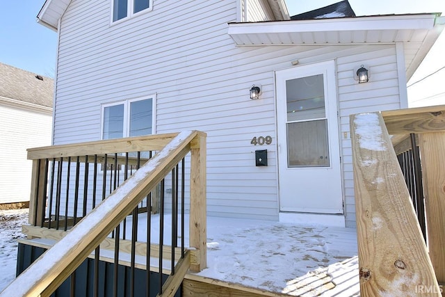 view of snow covered deck