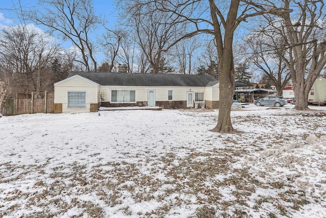 view of snow covered house