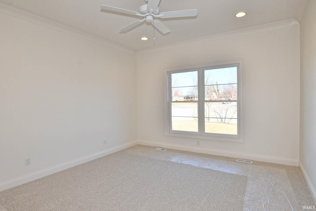 unfurnished room with light carpet, ornamental molding, and ceiling fan