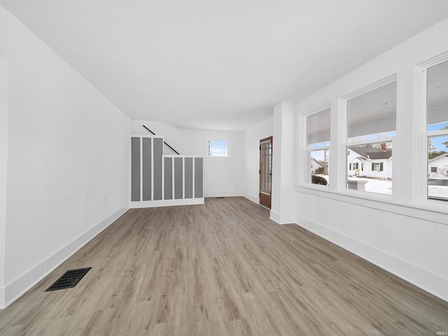 spare room with light wood-type flooring