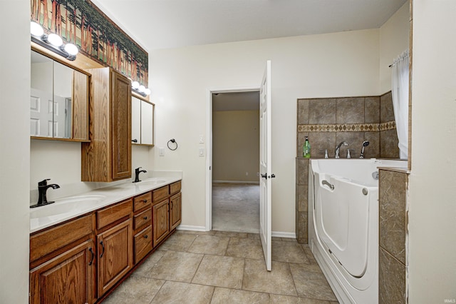 bathroom with vanity and a bathtub