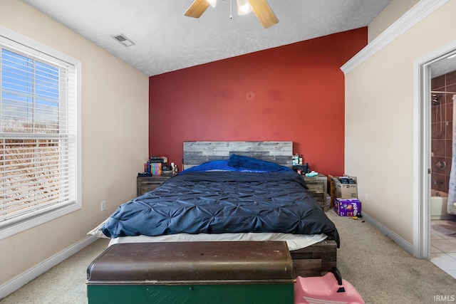 bedroom with multiple windows, lofted ceiling, carpet, and ceiling fan