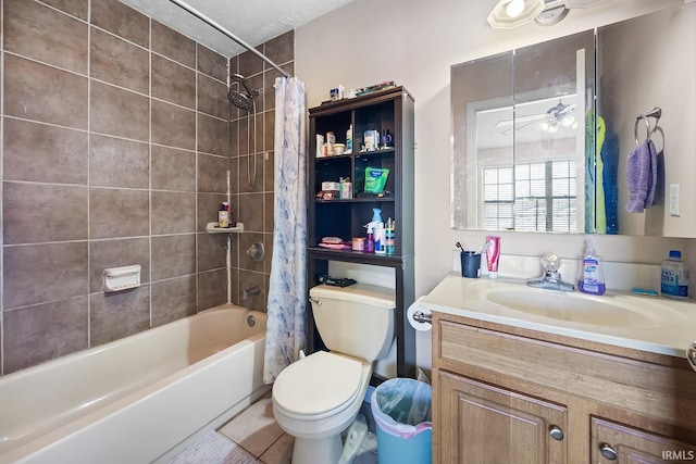 full bathroom featuring tile patterned flooring, vanity, shower / bath combination with curtain, a textured ceiling, and toilet