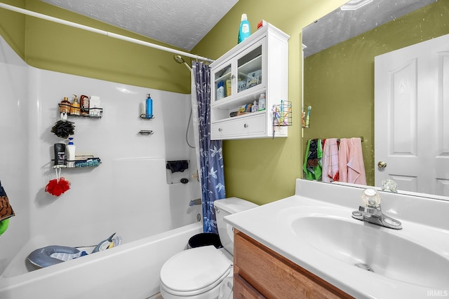 full bathroom with vanity, toilet, a textured ceiling, and shower / bath combo with shower curtain