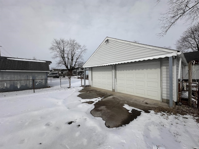 view of snow covered garage