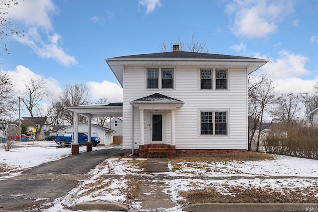 view of front of house with a carport