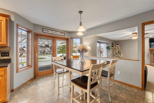 dining room featuring a textured ceiling