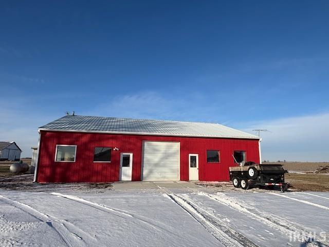 view of outdoor structure with a garage