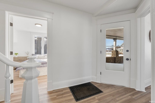 foyer entrance featuring hardwood / wood-style flooring