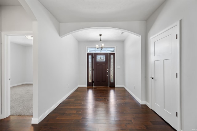 foyer with dark wood-type flooring