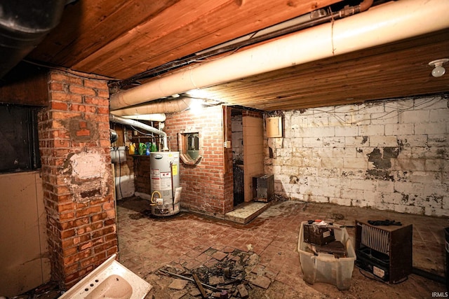 basement featuring gas water heater