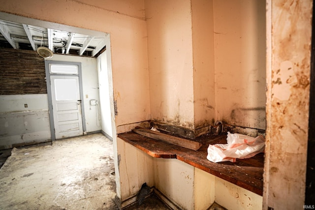 miscellaneous room with concrete flooring