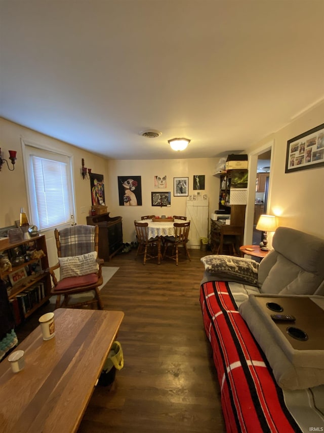 living room with dark hardwood / wood-style floors