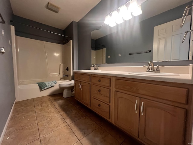 full bathroom featuring vanity, toilet, tile patterned floors, and  shower combination