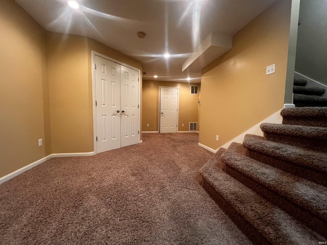 basement with carpet floors