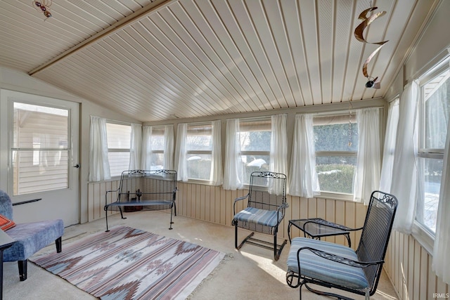 sunroom with lofted ceiling and wood ceiling