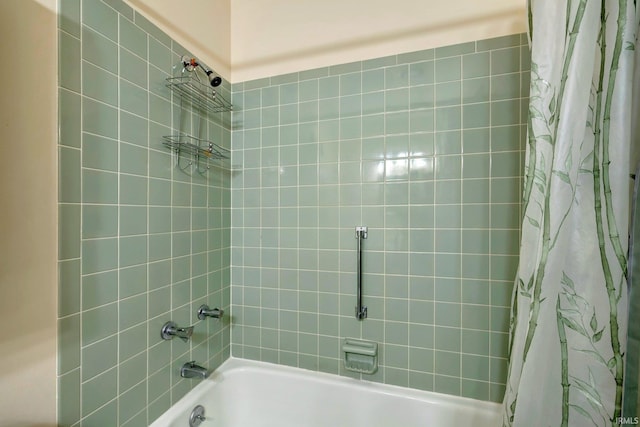 bathroom featuring shower / bath combo with shower curtain