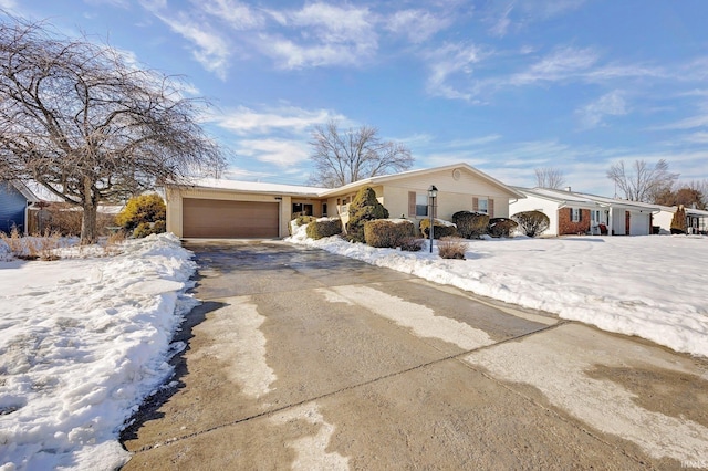 ranch-style home with a garage