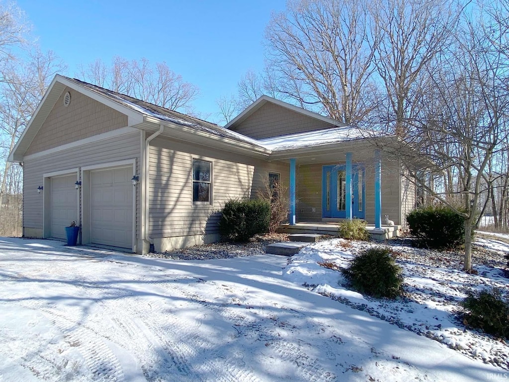 ranch-style home with a garage