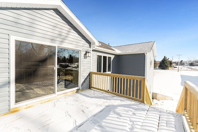 view of snow covered deck