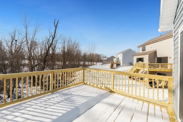 view of snow covered deck