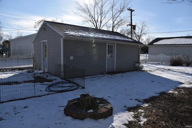 view of snow covered garage