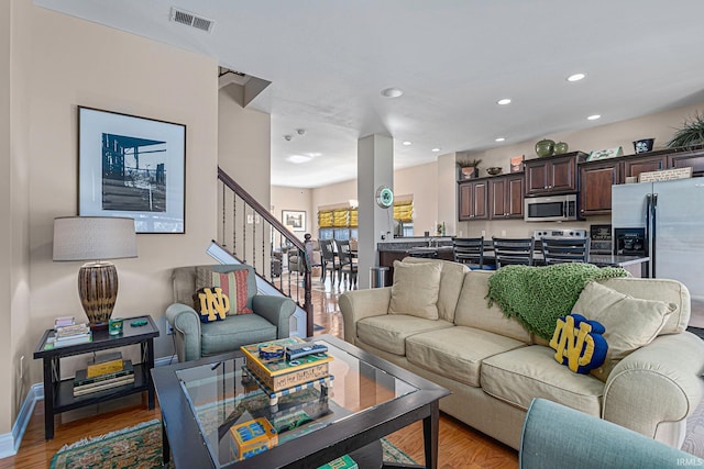 living room featuring hardwood / wood-style floors