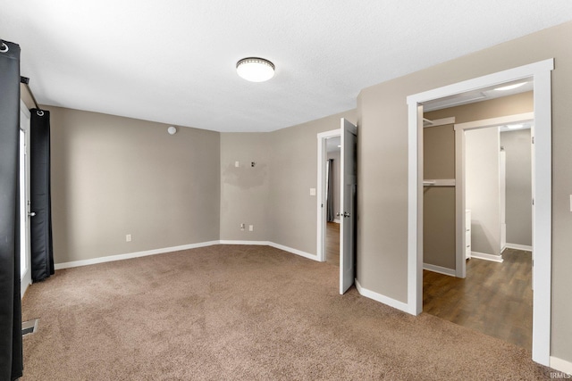 unfurnished bedroom featuring carpet flooring