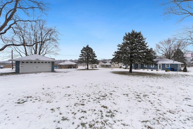 view of yard covered in snow