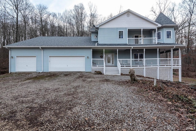 view of front of home with a garage and a porch