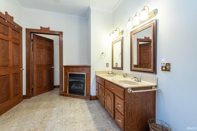 bathroom with ornamental molding and vanity