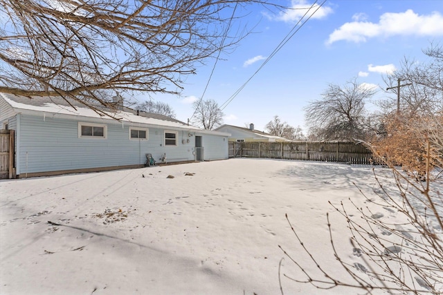 view of snow covered property